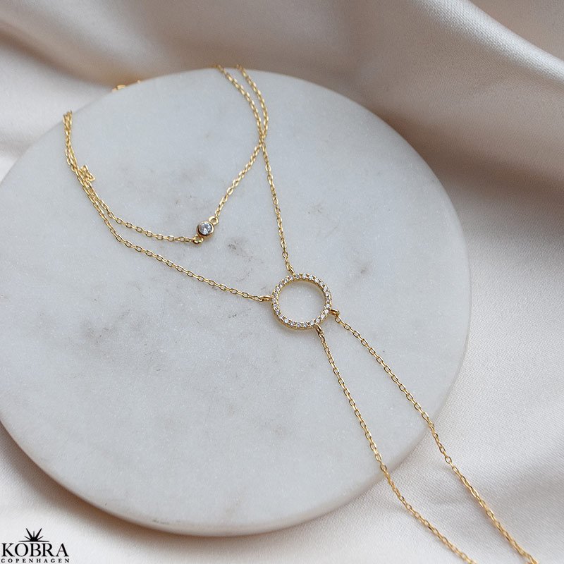 "Rising Sun" gold bracelet and ring