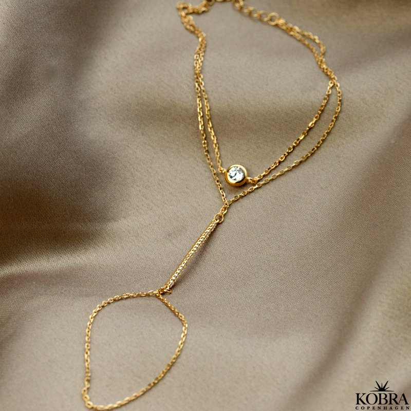 "Yasmine" 18 carat gold plated hand chain and ring