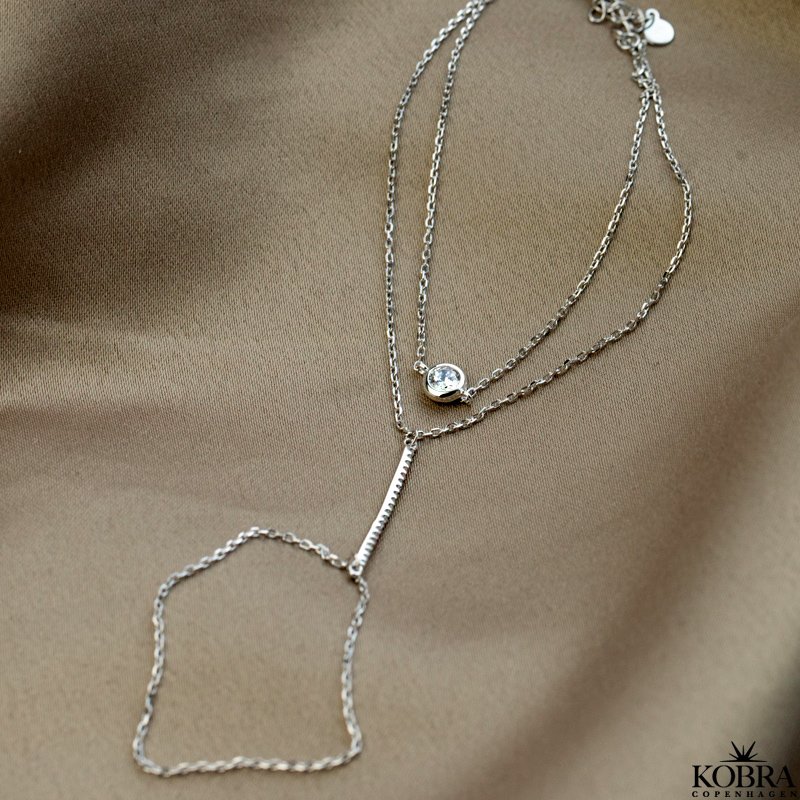 "Yasmine" hand chain and ring in sterling silver