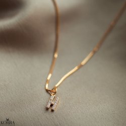 "Alias" gold necklace with your letter