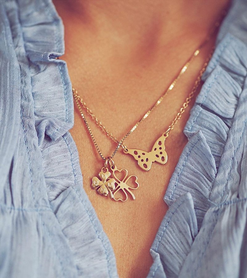 "Giselle" guld halskde med sommerfugl