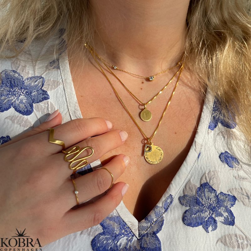 "Frida" enkel 18 karat forgyldt ring med hvid zirkonia