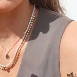 "SOL" gold necklace with small suns