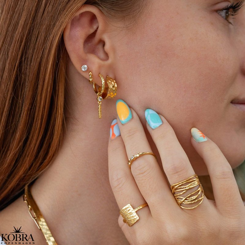 "Pippi" guld "slange" reringe med hvide sten