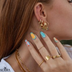 "Hailey" enkel guld ring med hvide sten