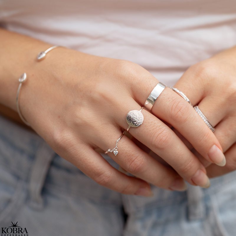 "Suma" simple raw silver ring with small round plate