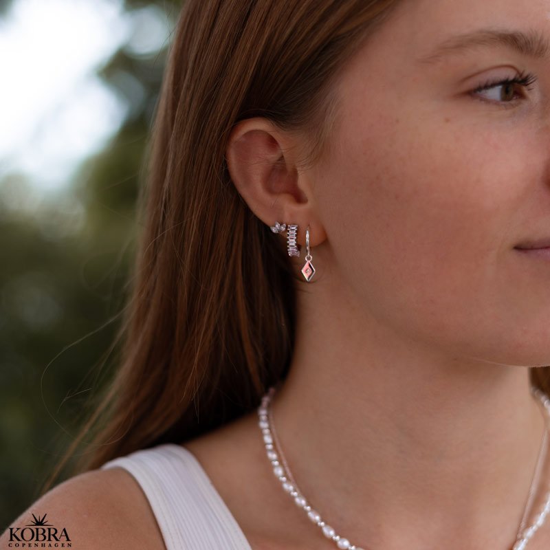 "Harlekin" slv reringe med sten