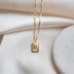 "Radiant Heart" halsband i 18k f�rgyllt