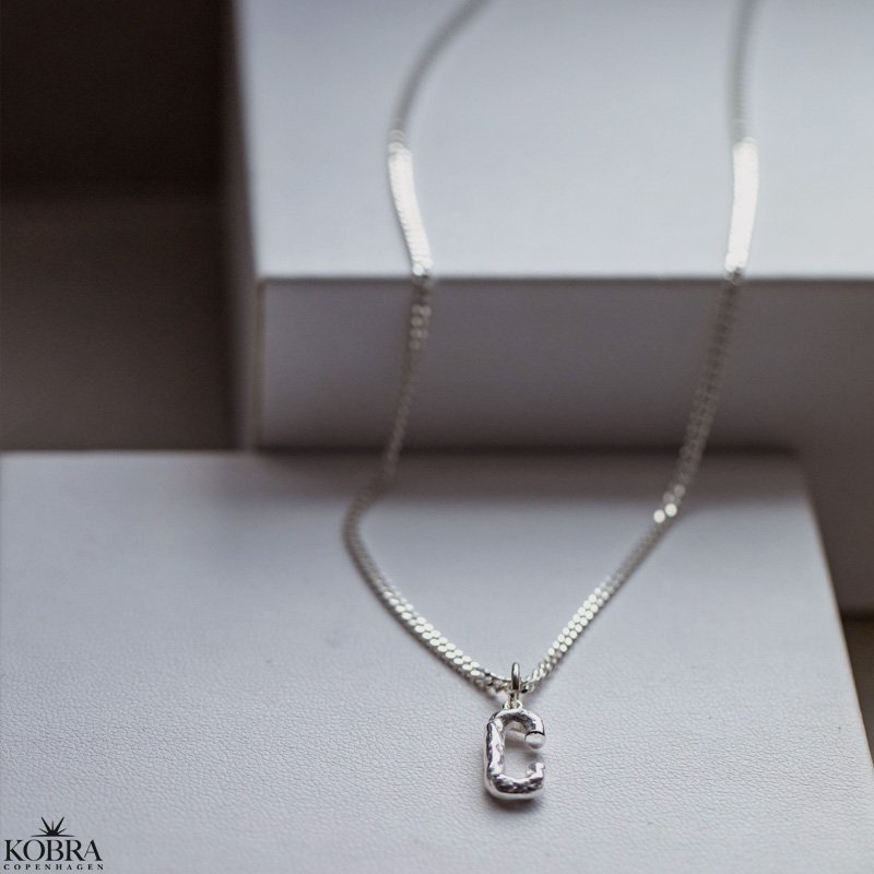 "Morton" slvhalskde med dit bogstav