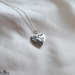 "Hannah" Hjerteformet medaljon i sterling slv  med sommerfugl og plads til 2 billeder