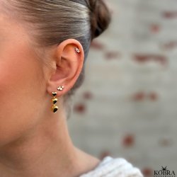 "Lily" guld restikker med hvide sten