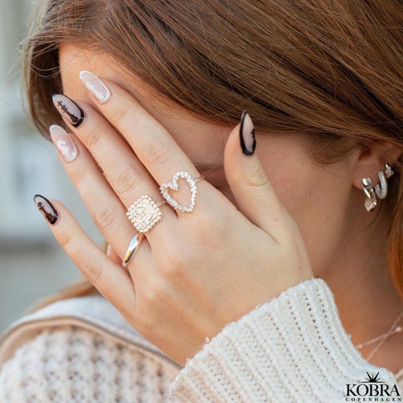 "Moondust" gold ring with moons and stars