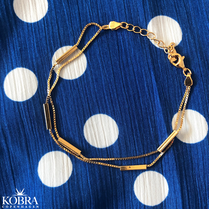 "Holly" 2i1 armbnd i guld