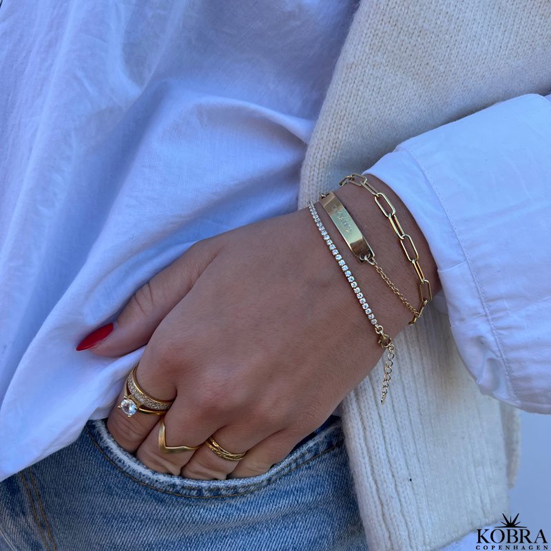 "Ivy" tennis armbnd i guld