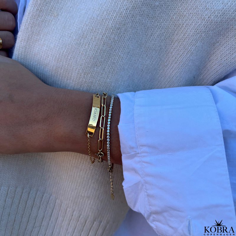 "Ivy" tennis armbnd i guld