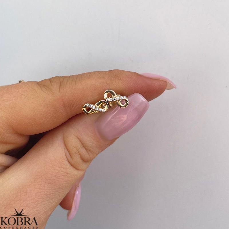 "Bound" Infinity earrings in gold with stones