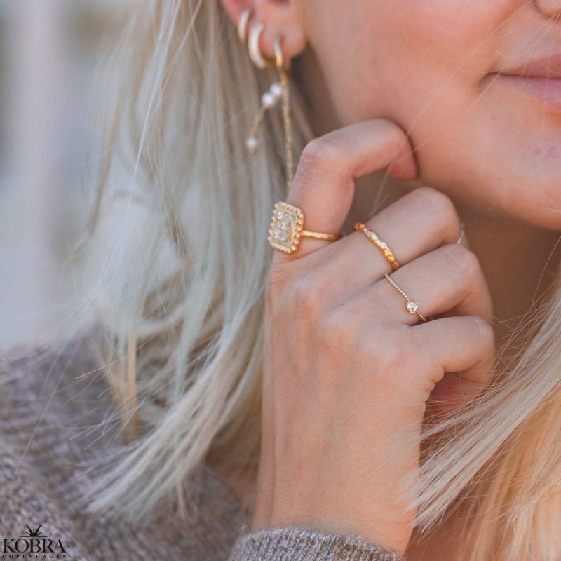 "Moondust" gold ring with moons and stars
