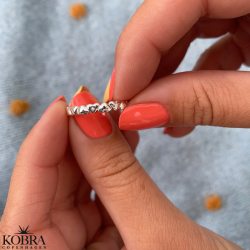 "Kaitlyn" silver ring with small hearts and a white stone