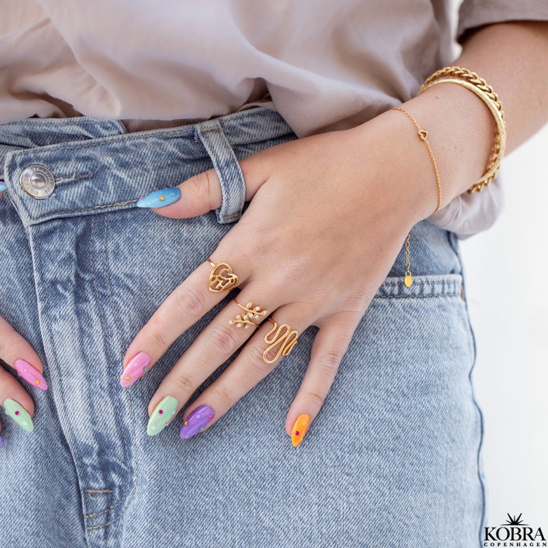 "Flow" slange ring i guld