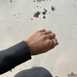 "Cassiopeia" gold signed ring with star and white stone