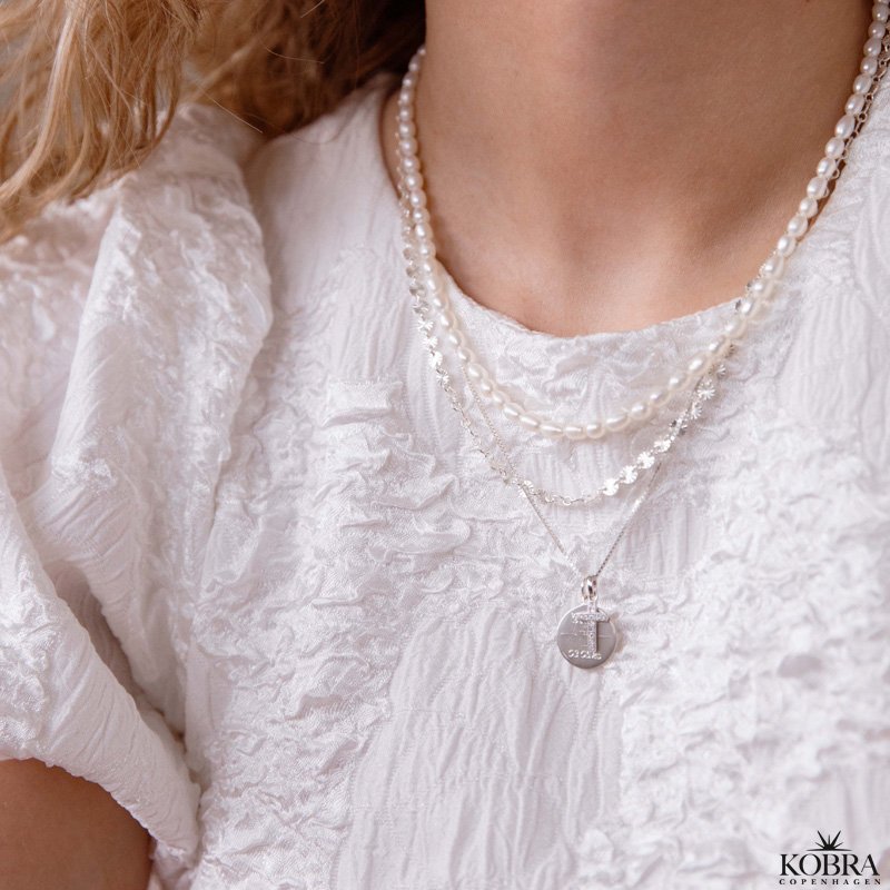 "SOL" slv halskde med sm sole