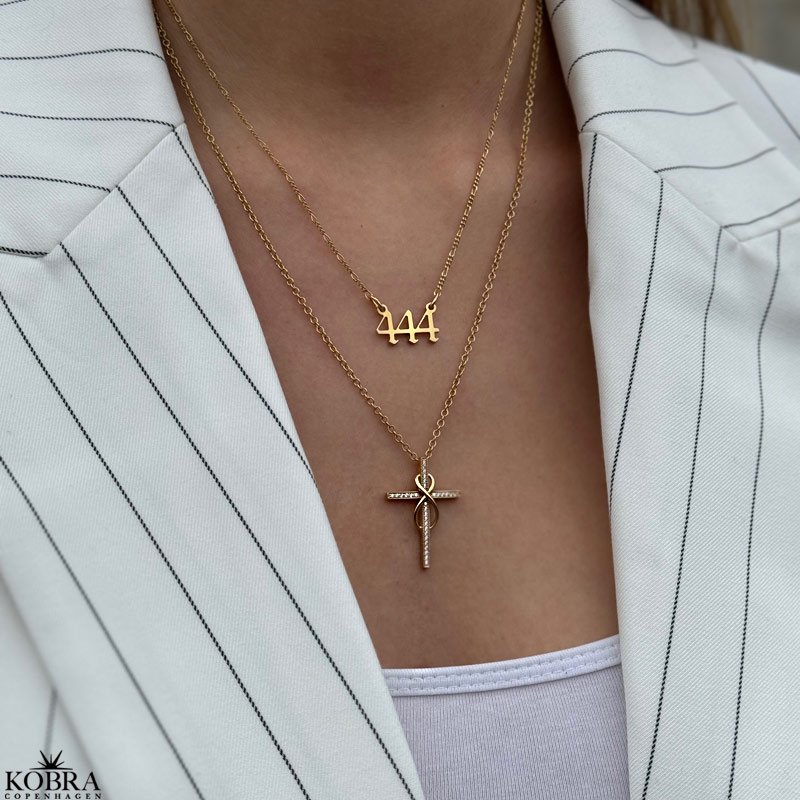 "Allana" cross necklace 18 karat gold plated with Infinity
