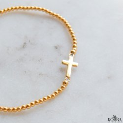 "Enna" gold cross bracelet with balls