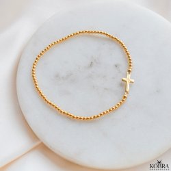 "Enna" gold cross bracelet with balls