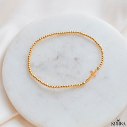 "Enna" gold cross bracelet with balls