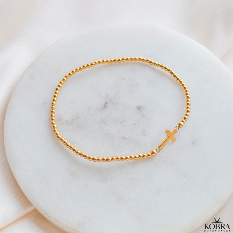 "Enna" gold cross bracelet with balls
