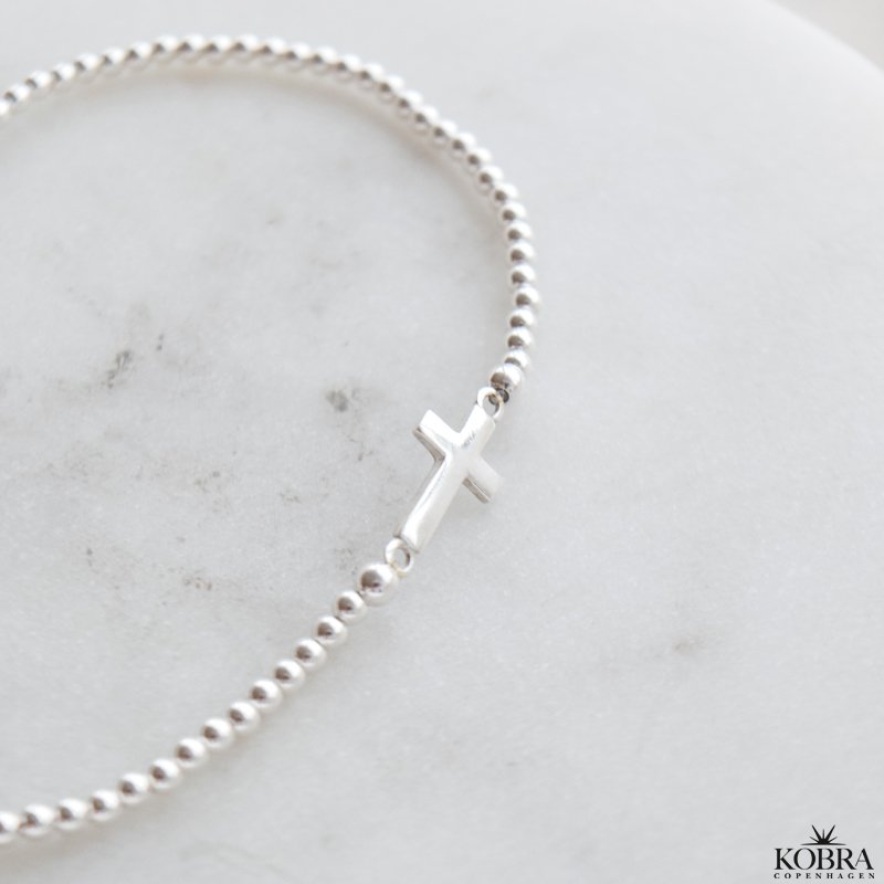 "Enna" slv kors armbnd med kugler
