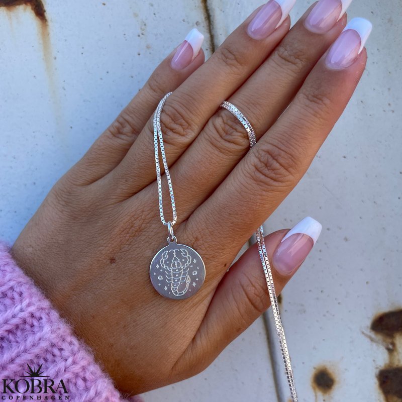 "Blazing Star" stjernetegns halskde i sterling slv