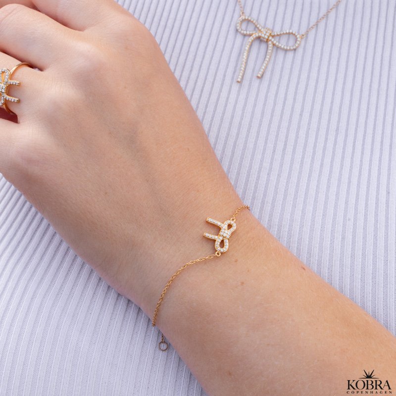 "Leonora" 18 carat gold-plated bow bracelet with white zirconia