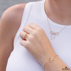 "Leonora" 18k gold plated bow necklace with stones