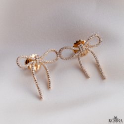 "Leonora" fine sljfe reringe med sten i guld