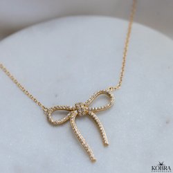 "Leonora" 18k gold plated bow necklace with stones