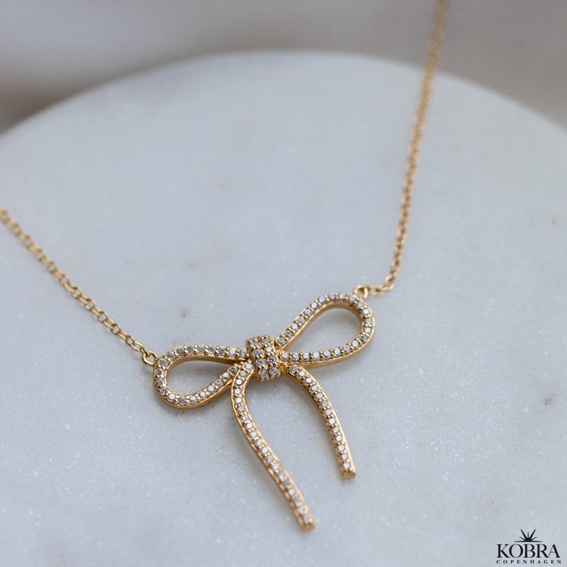 "Leonora" 18k gold plated bow necklace with stones