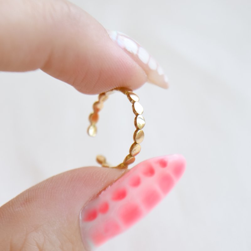 "Lottie" t�ring med kugledesign i guld