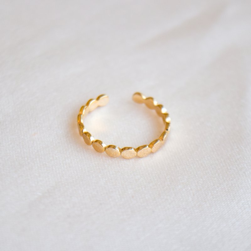 "Lottie" t�ring med kugledesign i guld