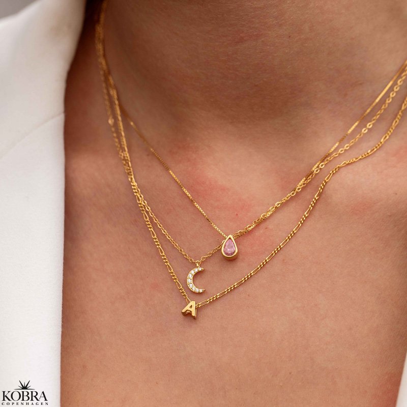 "Lunar" moon necklace with stones in gold