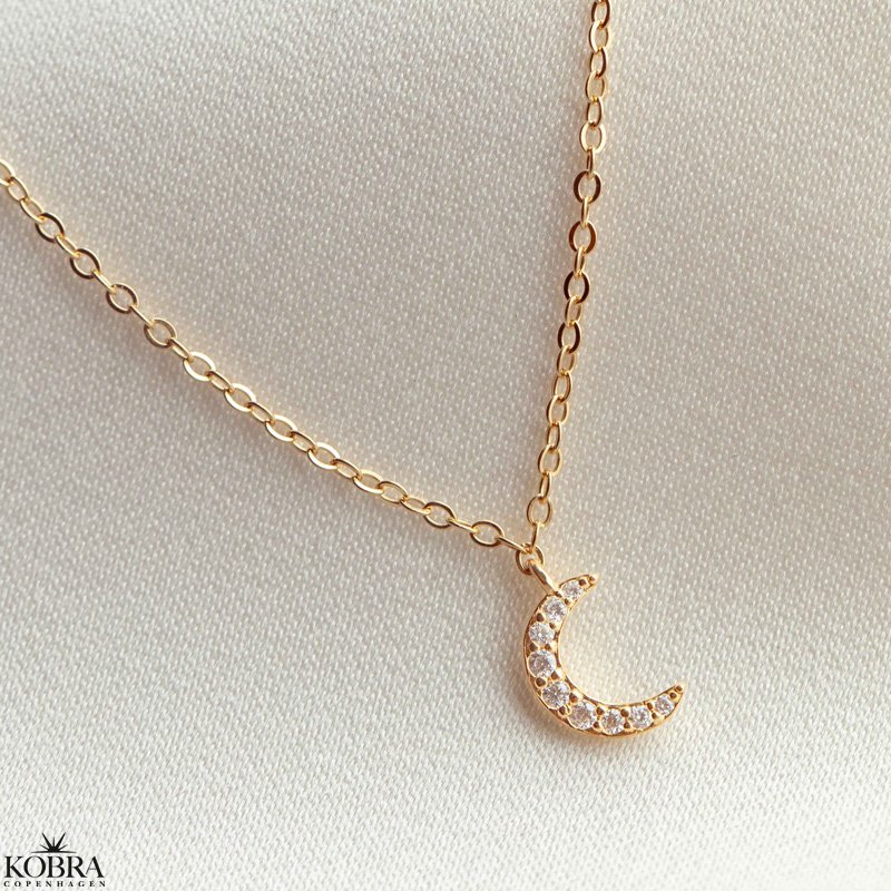"Lunar" moon necklace with stones in gold