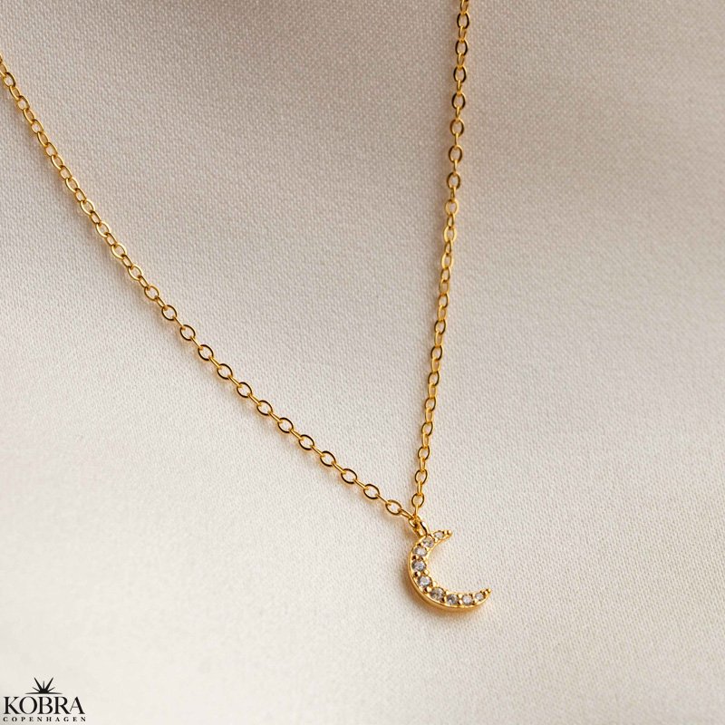"Lunar" moon necklace with stones in gold