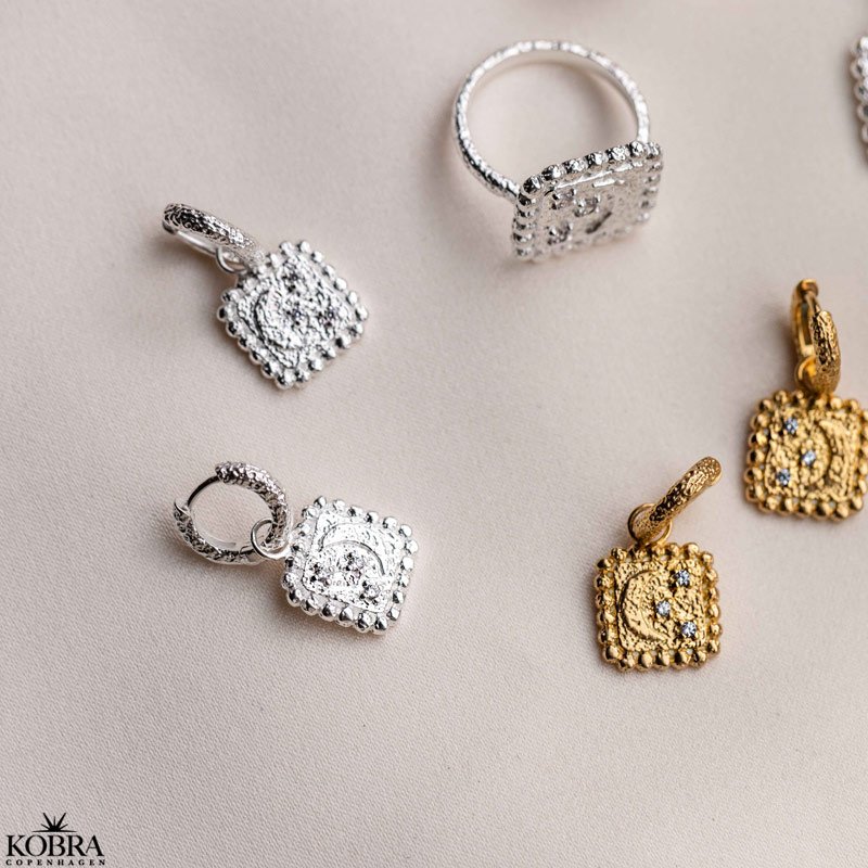 "Moondust" 18k gold-plated earrings with moons and stars