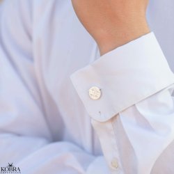  Round silver cufflinks with cross engraving