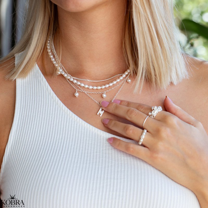 "Alias" silver necklace with your letter