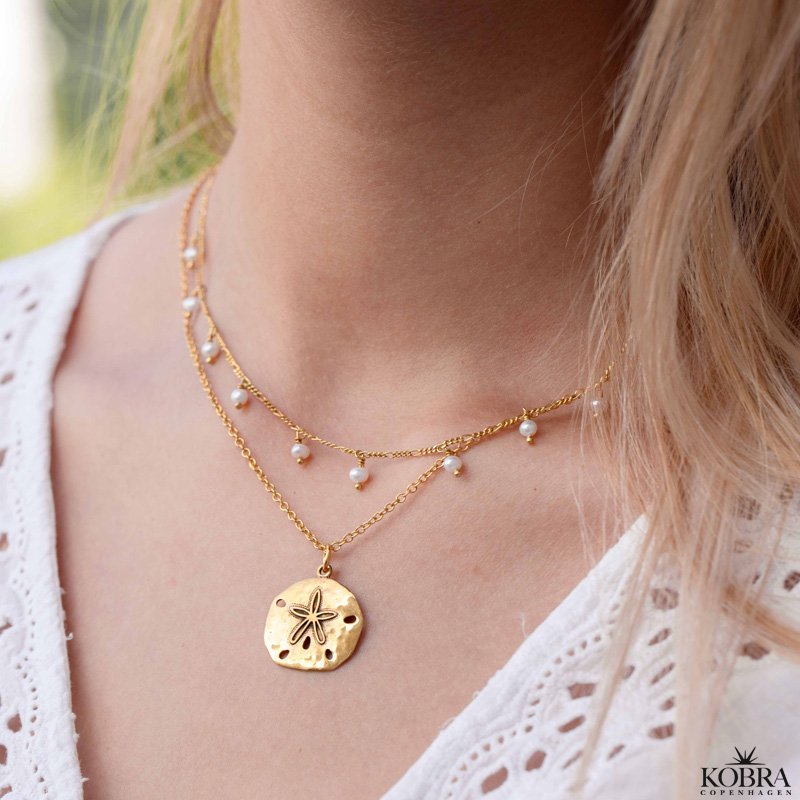 "Mayflower" guld halskde med hammerslet amulet