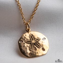 "Mayflower" guld halskde med hammerslet amulet