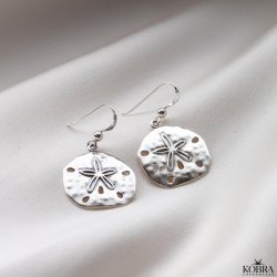 "Mayflower" slv sstjerne reringe med hammerslet amuletter