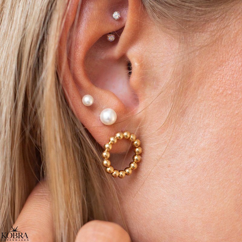 "Mellow" reringe med guld-kugler