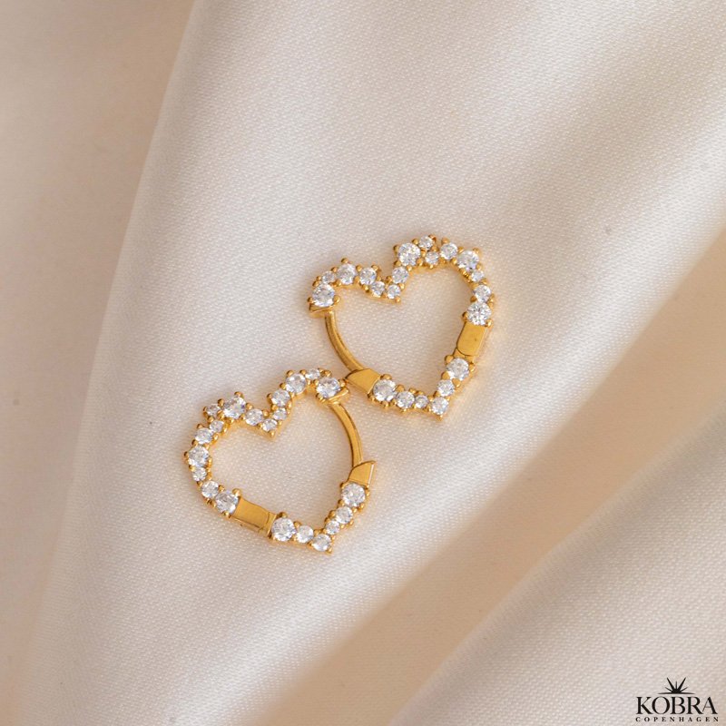 "Mikami" small gold heart earrings with white stones